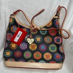 NWT Dooney and Bourke Extra Large Hobo in the Medallion pattern.